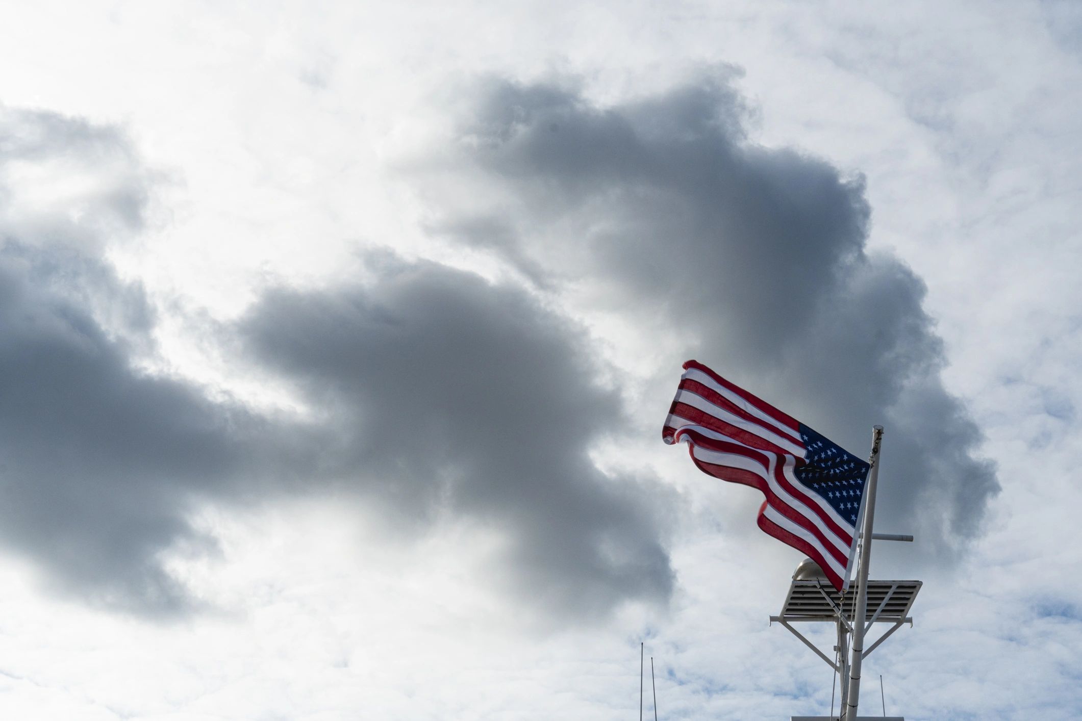 Wide Shot of American Flag Blowing in the Wind